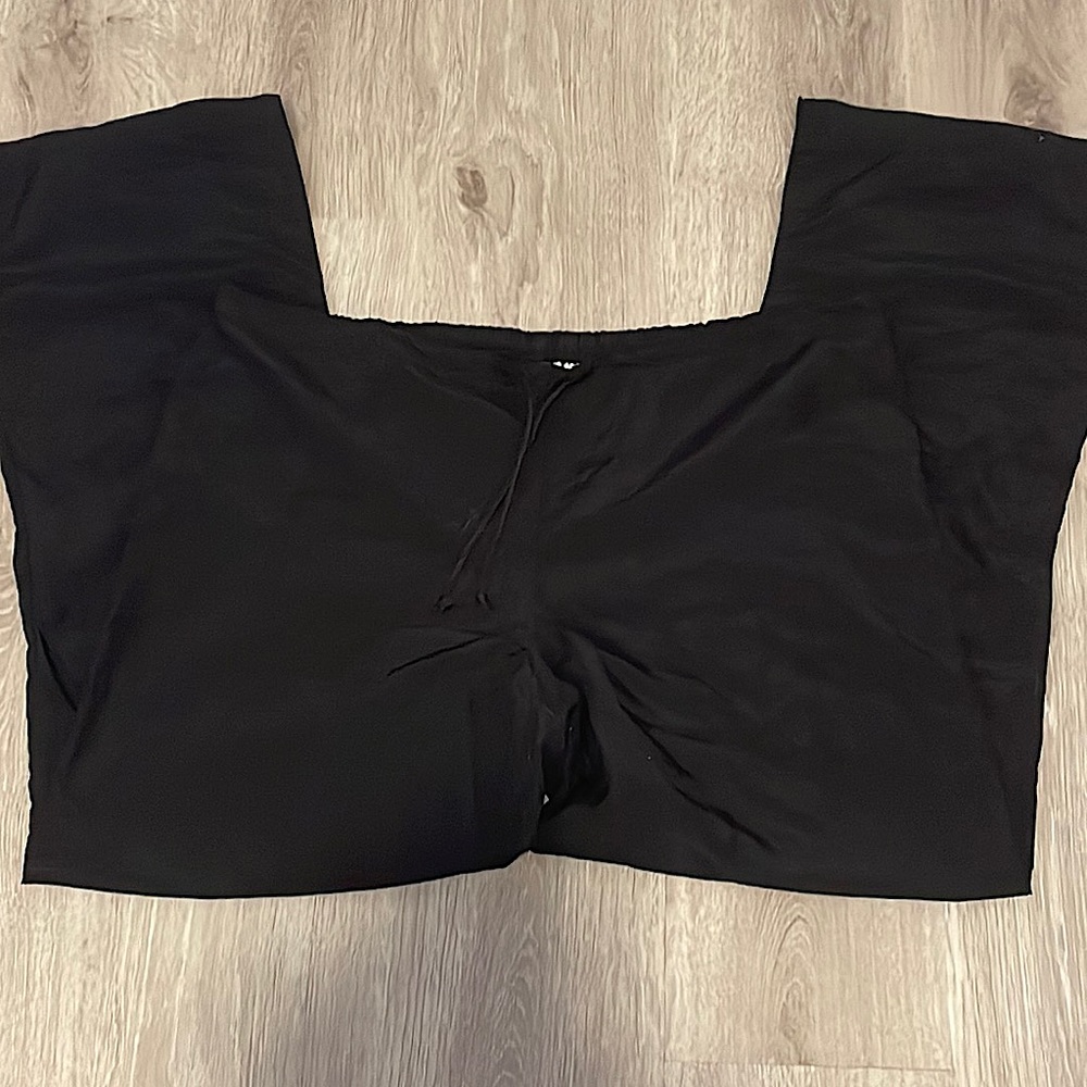 Black parachute pants